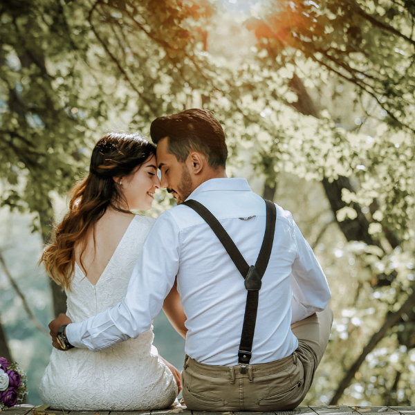 happy couple in forest