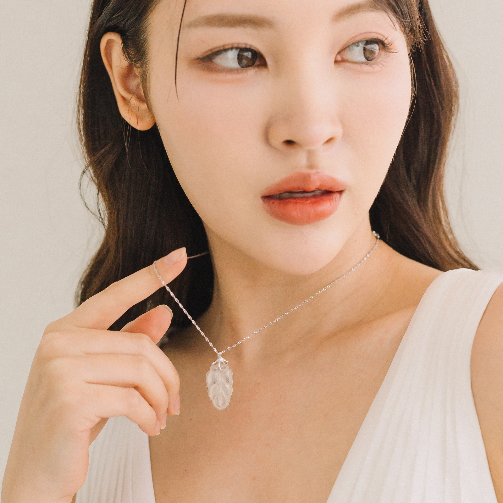 White jade leaf pendant with rare tree root design