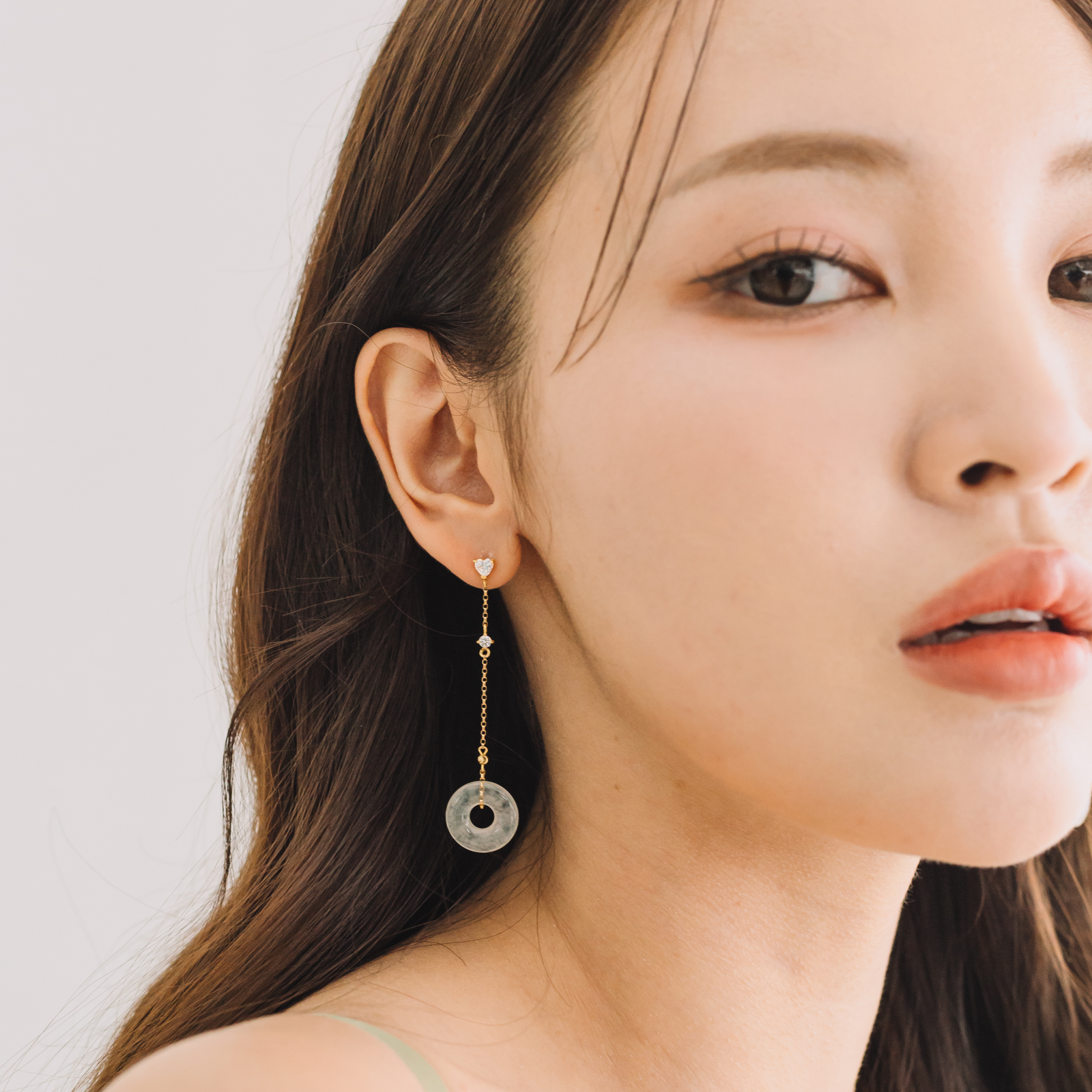 Pure white jade earrings with cool diamonds