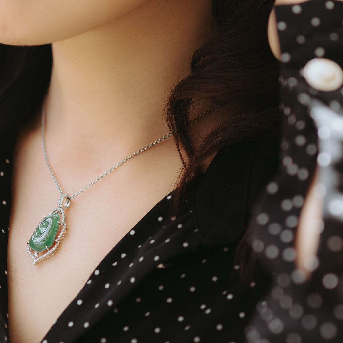 Wearing green jade pendant with stylish dress
