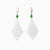 White jade earrings shaped to look like clouds. With green jade orb and diamonds