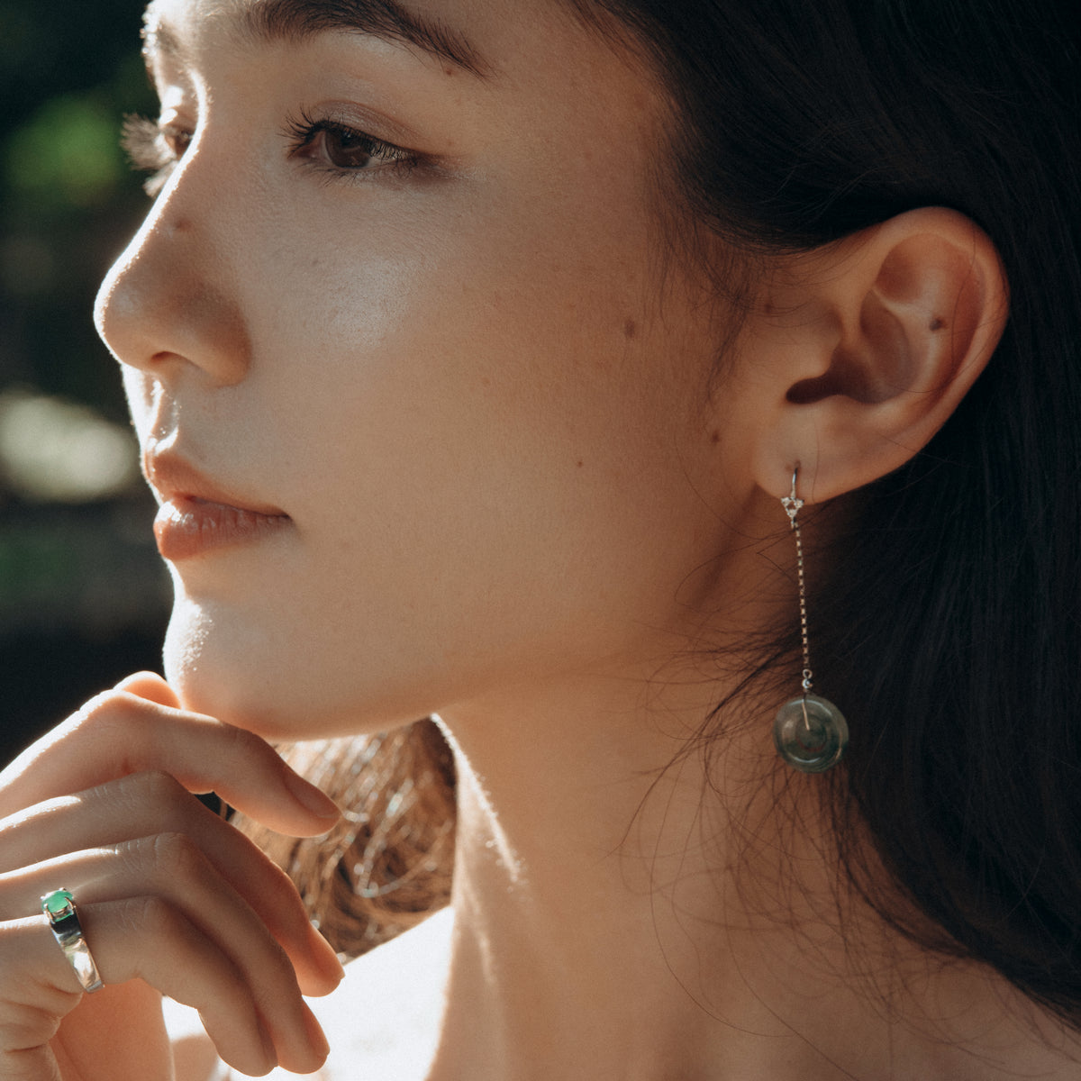 Wearing 21st century jade ring &amp; earrings