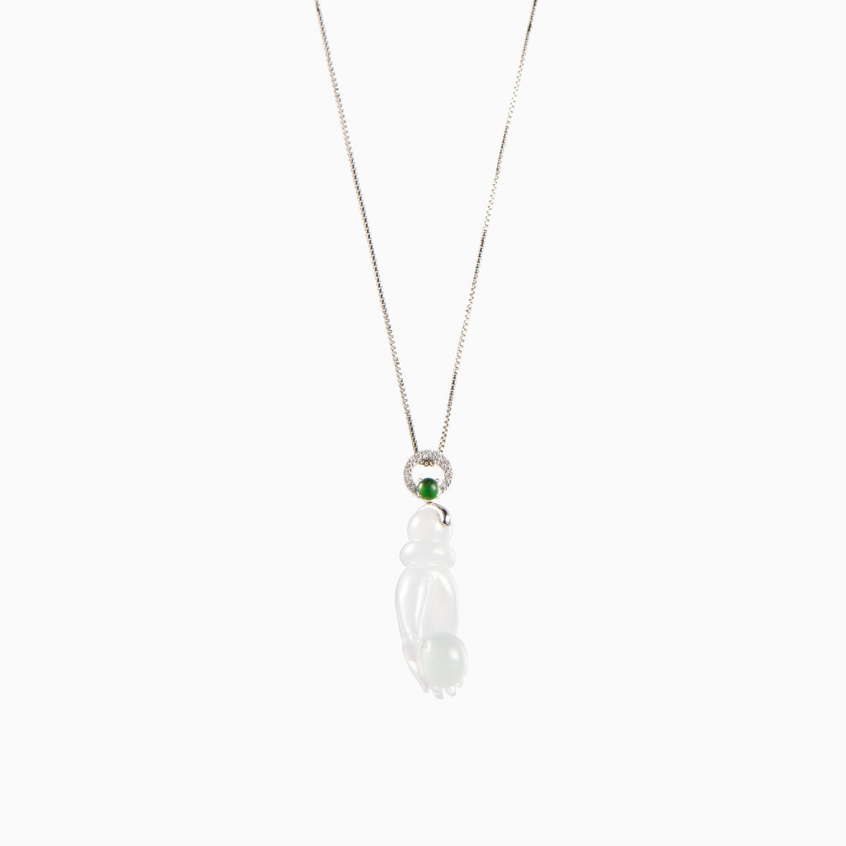 White jade buddha&#39;s hand pendant decorated with green jade and diamonds