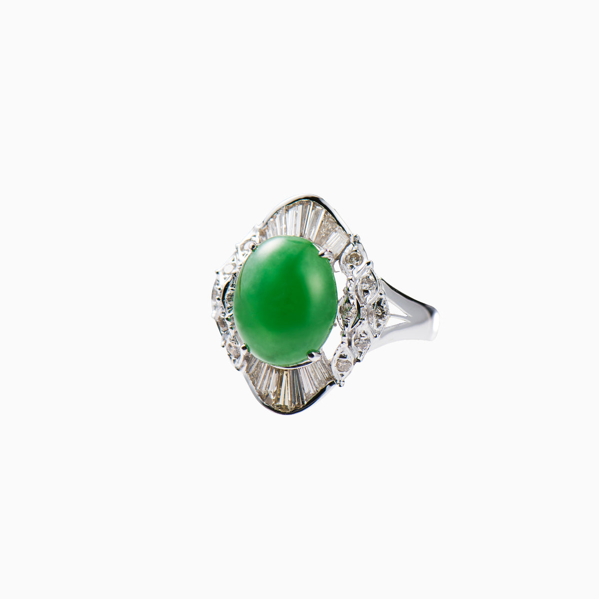 Green jade ring framed by a crown of Baguette Diamonds
