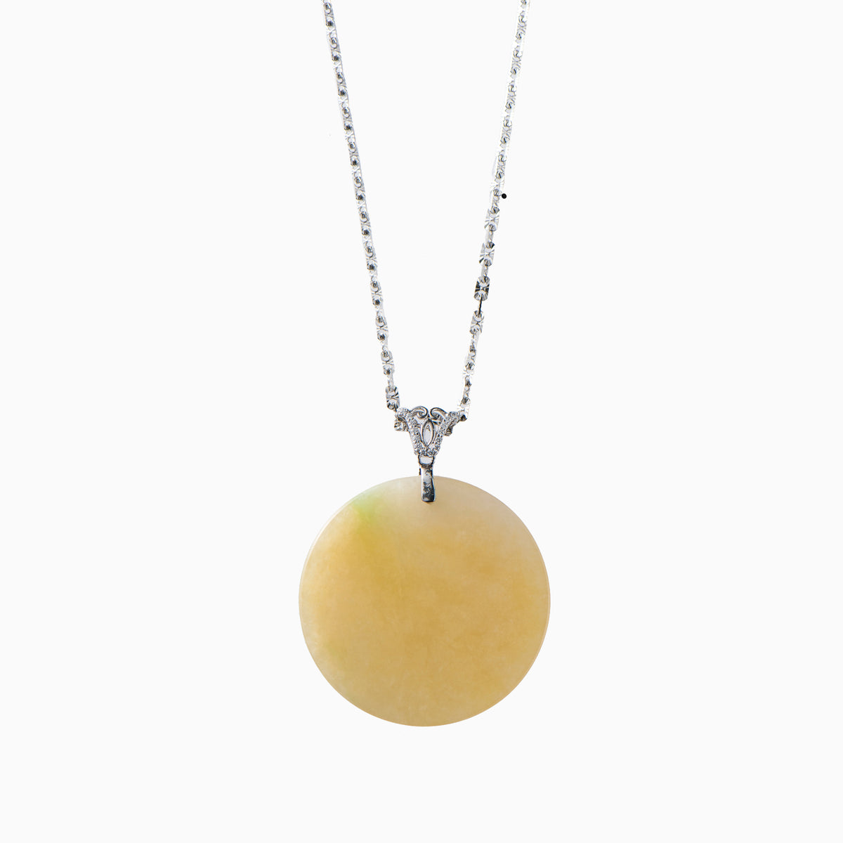 Yellow jade crafted into a circular amulet