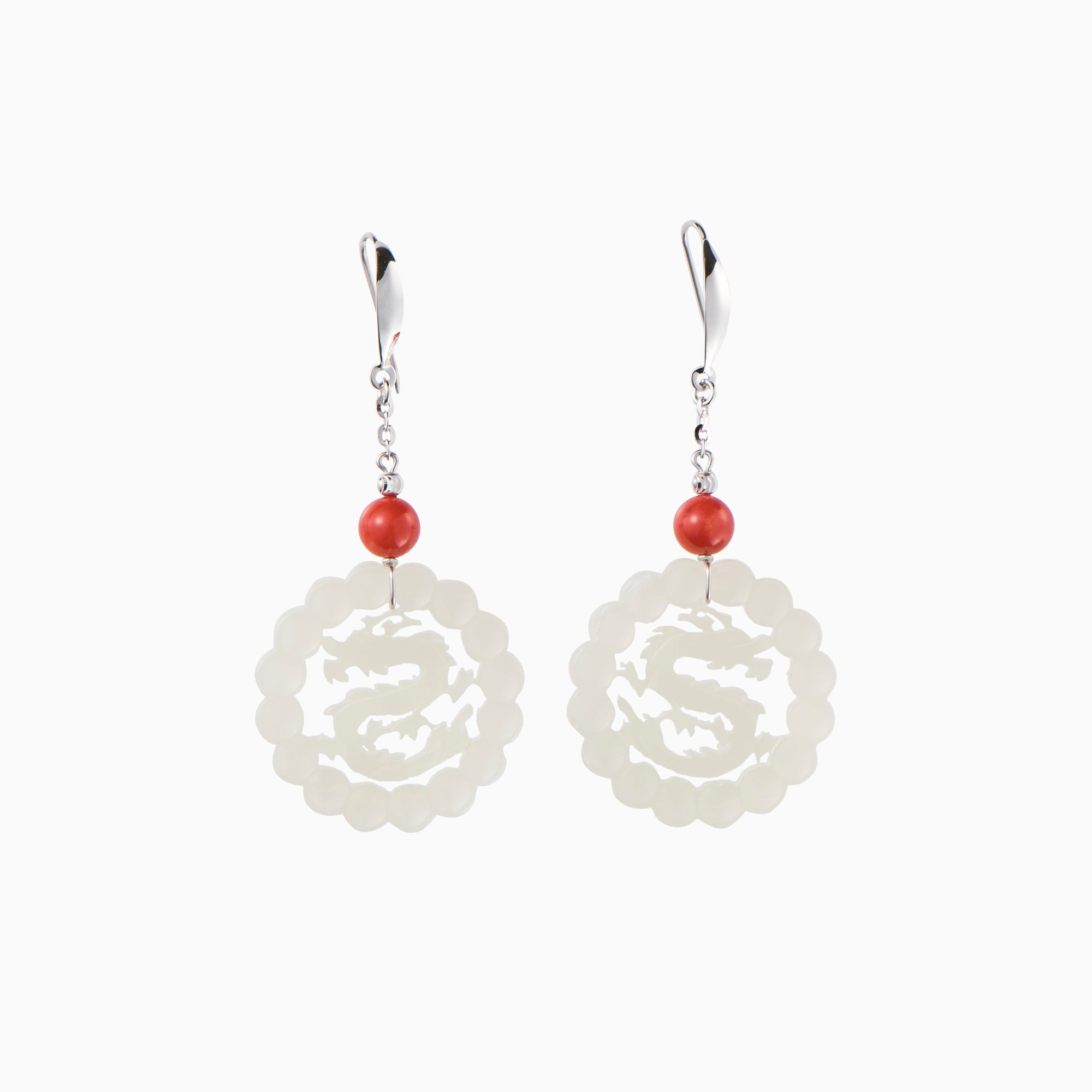 White jade dragon earrings with coral sphere