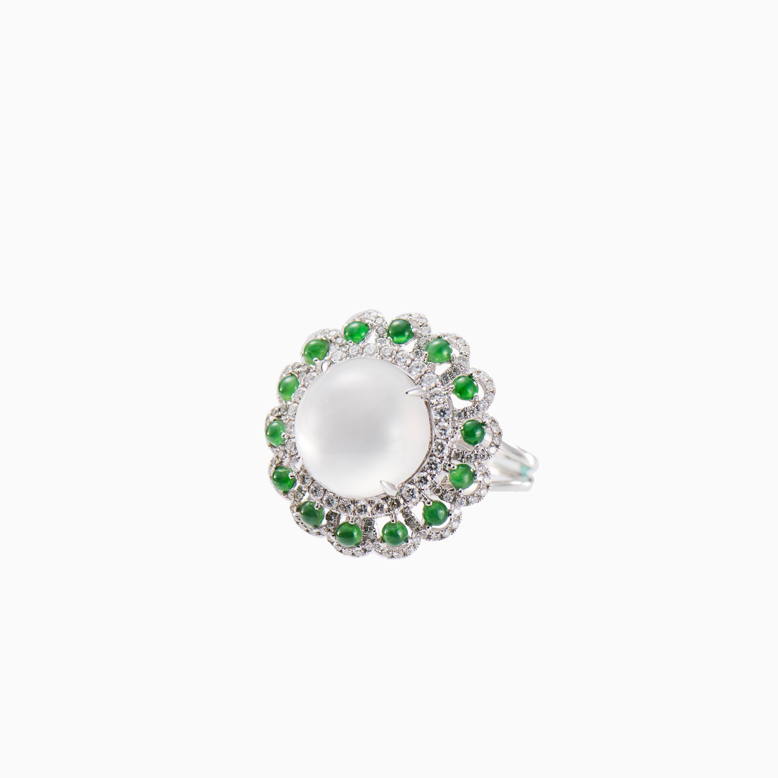 A stylish white jade ring called "Aura" surrounded by diamonds and green jade
